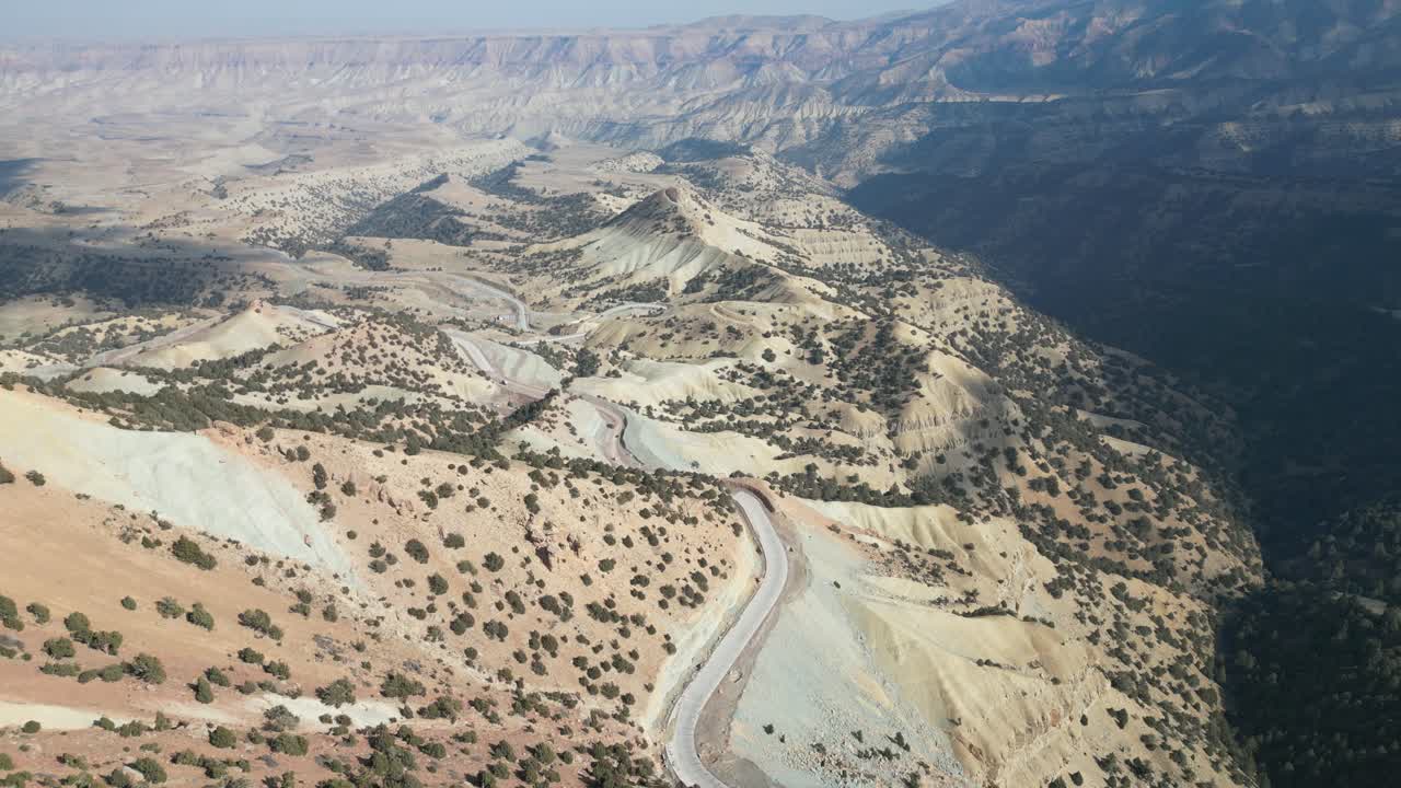 Siah Koh mountains Afghanistan Drone Aerial flight over wilderness and arid, remote barren desert ridges, Badghis