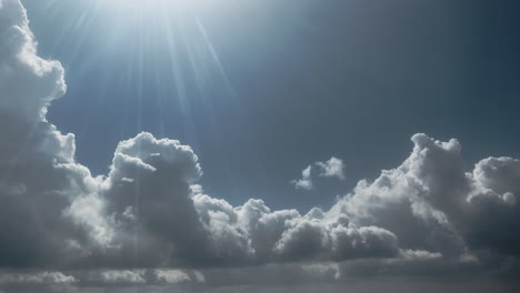 sunlight piercing through clouds