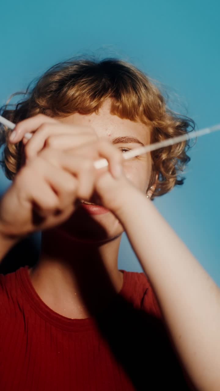Woman Holding Strings with American Flag