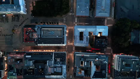 Oslo,-Norway-Night-Time-Aerial-of-central-Oslo,-city-overview,-cinematic-architecture-drone-topview-shot,-streetlight-glow,-illuminated-European-city,-4k-60fps