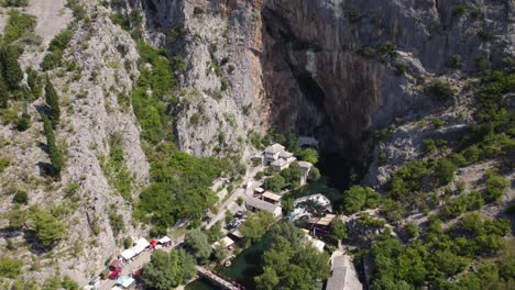 aerial overhead view of blagaj tekija, a cliffside monastery in bosnia and herzegovina