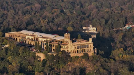 orbit shot of historical chapultepec castle in heart of green forest in mexico city