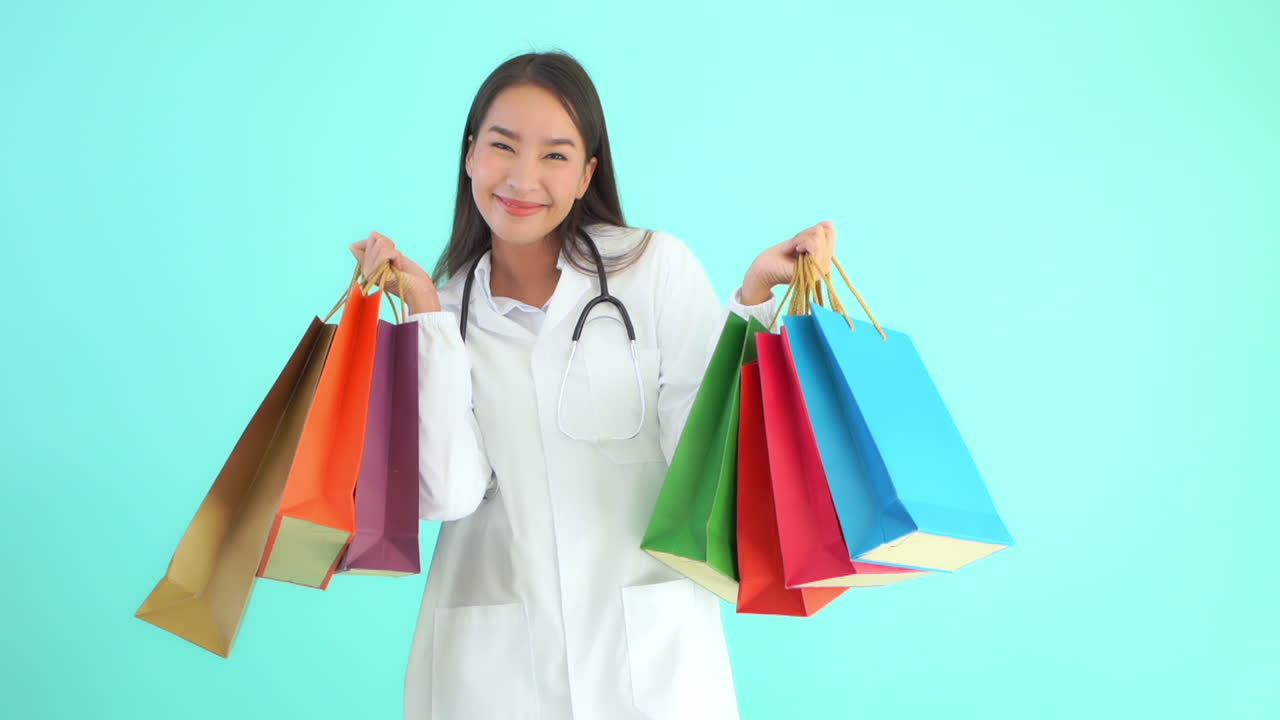 Happy Female Doctor Walking in Frame Carrying Shopping Bags Copy Space