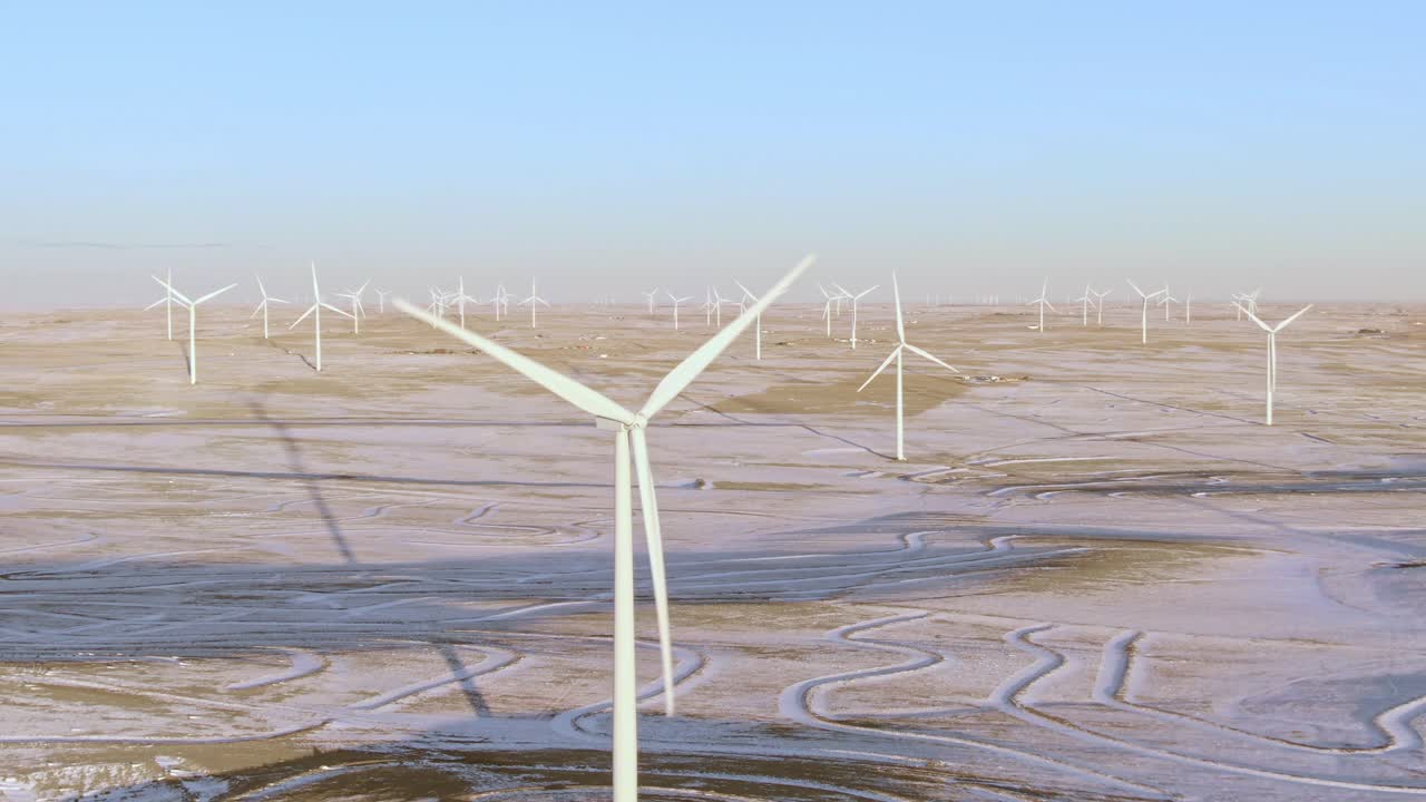 Aerial shots of wind turbines on a cold winter afternoon in Calhan, Colorado