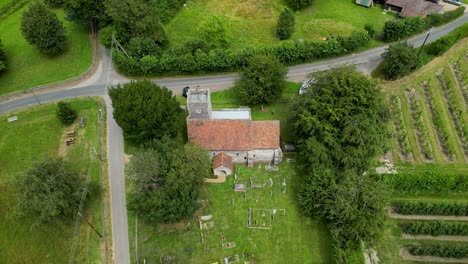 A-slow-high-altitude-push-in-shot-towards-Elmstone-church