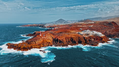 coastal cliffs and vibrant waves along the shores of gran canaria spain