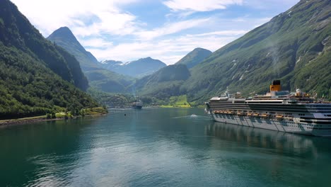 cruise liners on geiranger fjord, norway