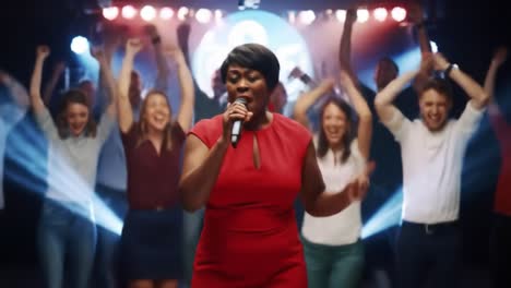 a confident performer captivates the audience with a powerful singing presence, surrounded by an enthusiastic crowd celebrating the live music experience