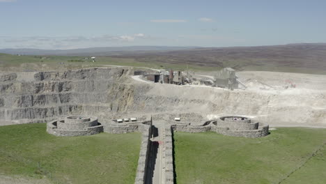 an aerial view of the coldstones cut public artwork near pateley bridge with an asphalt quarry in the background