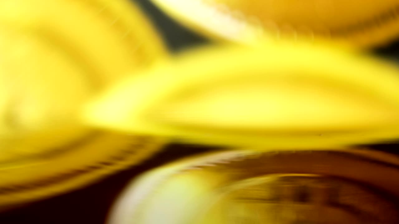 Time lapse growing rising columns stack pile of bitcoin cryptocurency mining business cash exchange success on reflecting table with blurred bokeh background crypto currency