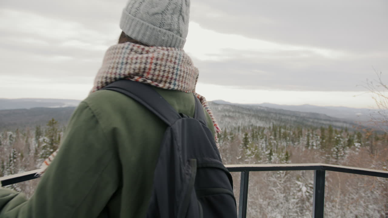Woman Hiking in Winter Landscape