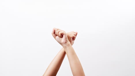 Close-up-of-a-fist-bump-opportunity-for-cooperation-isolated-on-a-white-studio-background-with-copy-space-for-placing-a-text-for-an-advertisement