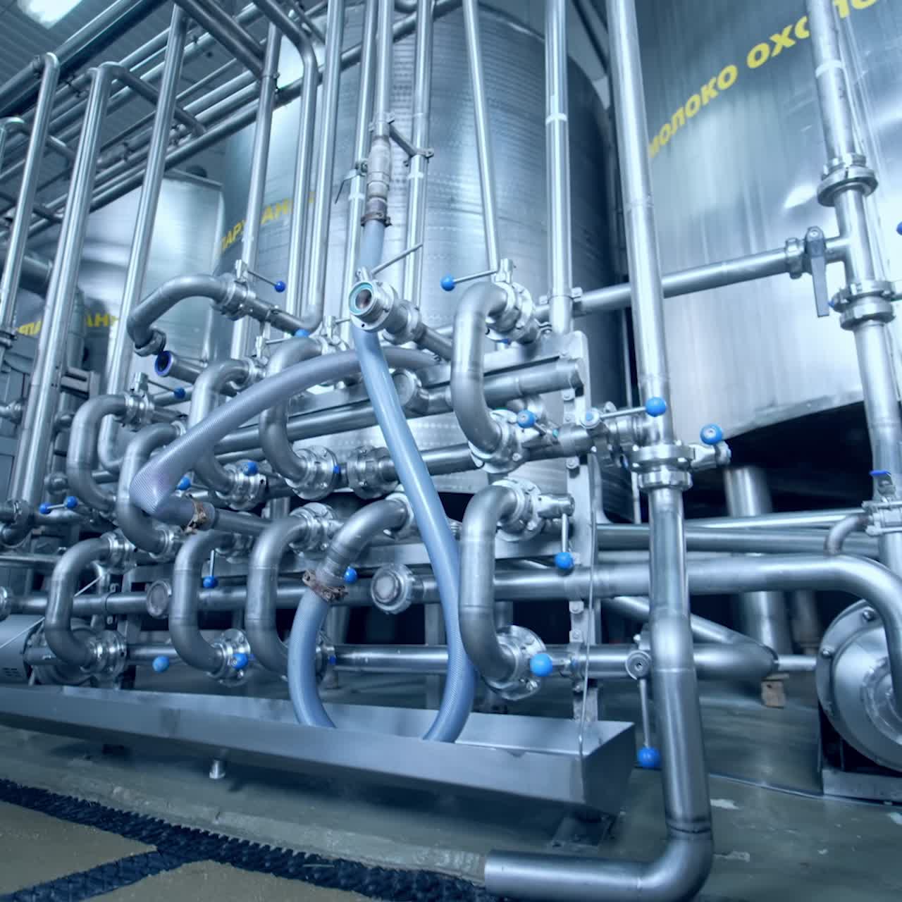 Large mechanism for dairy products. Very sophisticated mechanism for preparing dairy products