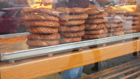 close up of freshly baked turkish bread (simit) displayed in a bakery window