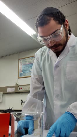 student conducting experiment in chemistry lab