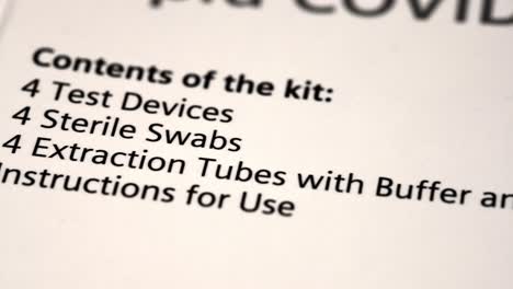 slow slider over the contents of a covid-19 test box