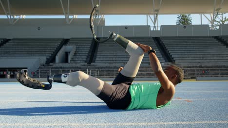 disabled athletic exercising on a running track 4k