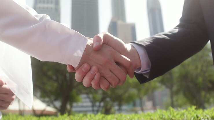 Two people sealing deal