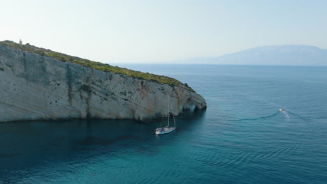 sailboat in a coastal cave