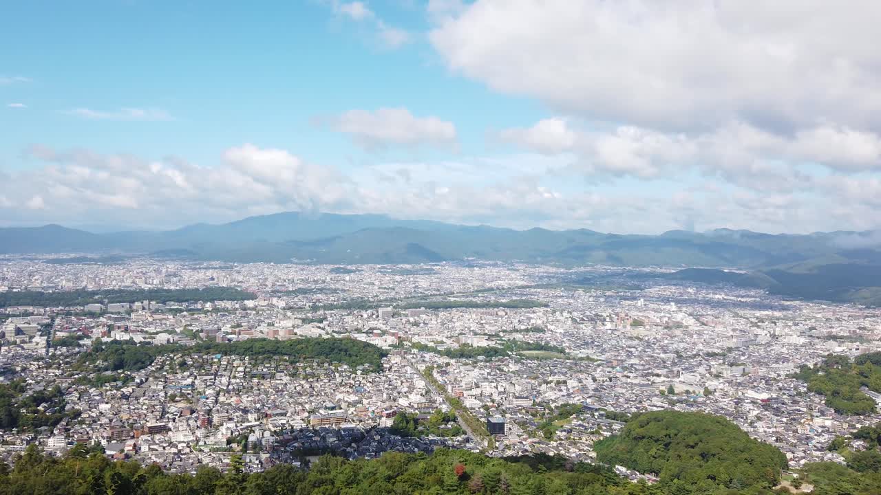 Aerial Panoramic Drone View of Kyoto City in Summer from Mount Nyoigatake, Japan