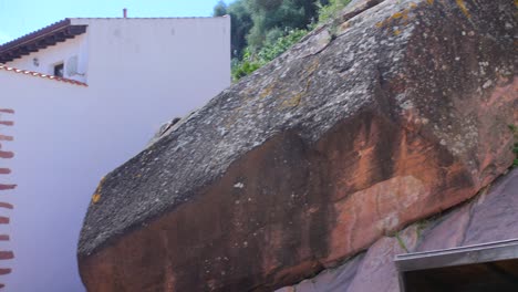 Panning-across-historic-monument-in-Vilafames-called-Roca-Grossa-aka-the-big-rock-in-Castellon,-Spain