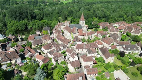 pull back reverse aerial carennac village in dordogne valley france