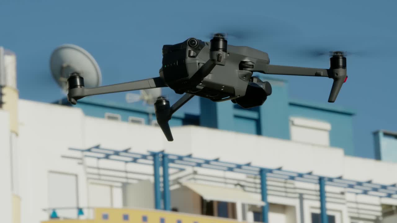 Drone hovering in the sky.