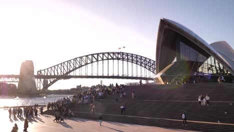 sydney opera house and harbour bridge at sunset