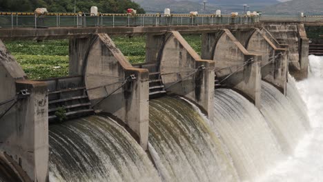 Hartbeespoort-floodgates-are-open,-white-water-rushes-through-sluice