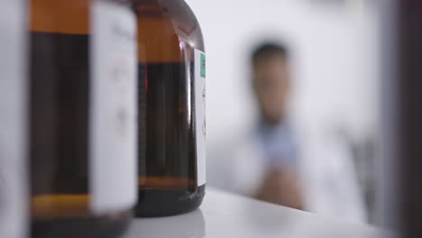 medicine, healthcare and bottle on shelf