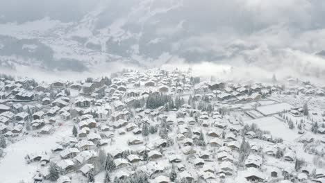 drone aerial of the beautiful resort and spa town verbier in the swiss alps