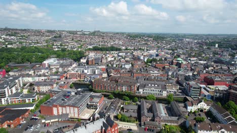 Right-panning-establishing-aerial-shot-of-Cork-city-on-cloudy-day