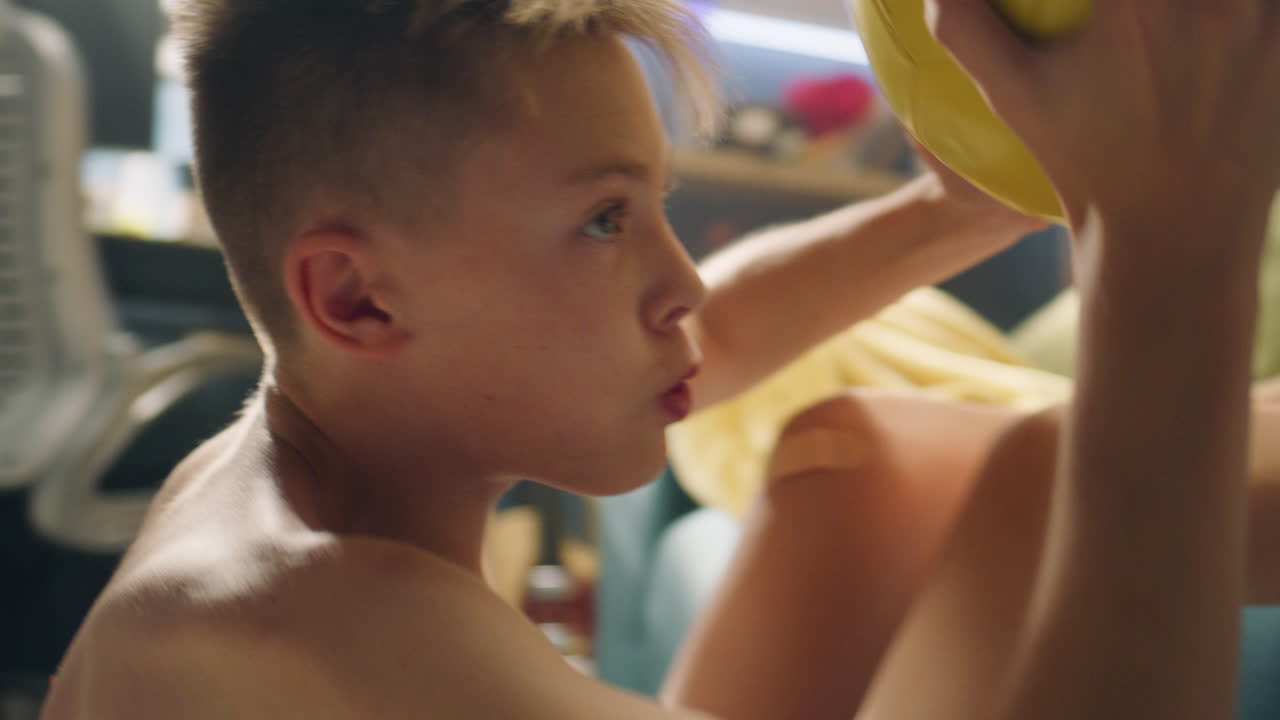 Boy doing sit-ups at home