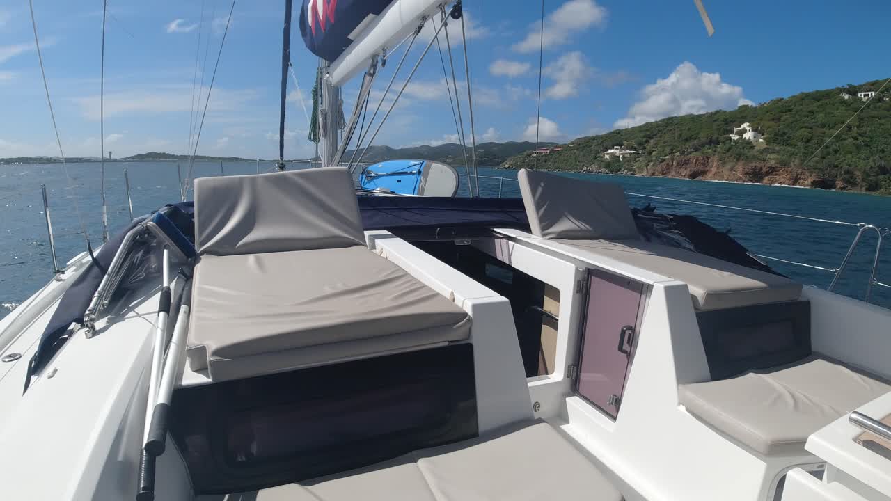 on the top deck of a large monohull sailing yacht in the British Virgin Islands