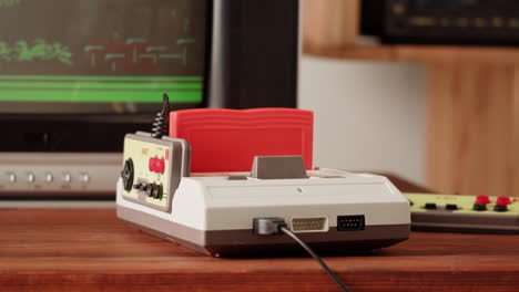 retro gaming experience: inserting a cartridge into a vintage nes console