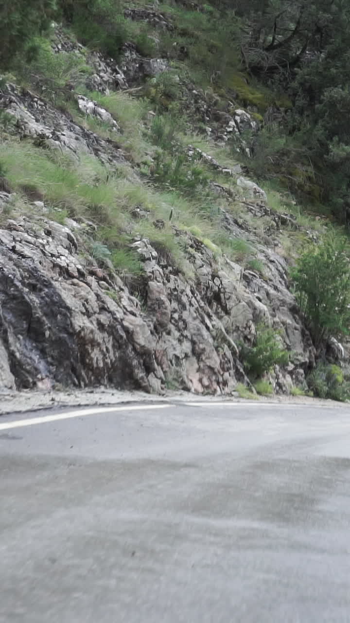 Motorcycle Ride Through Mountainous Road
