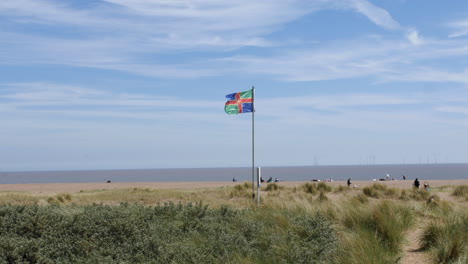 lincolnshire flag on a beach in chapel st leonards in skegness england