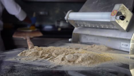 preparing pita in a middle eastern restaurant