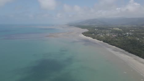 aerial view of four mile beach and the coral sea in port douglas, far north queensland, australia