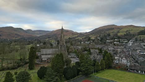 aerial footage of ambleside the lakeland town and former civil parish, now in the parish of lakes, in cumbria, in north west england 2023