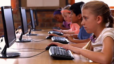 pupils in computer class at school