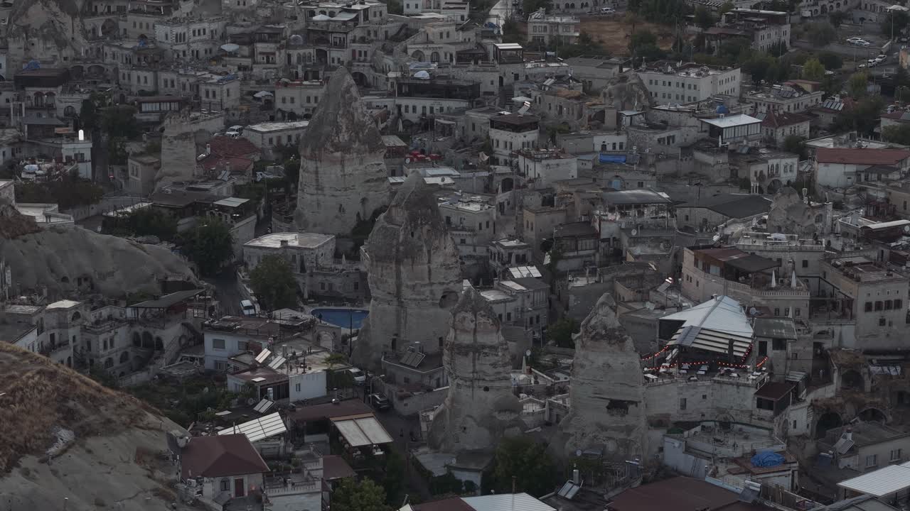 Scenic aerial footage of Turkey's historical cave dwellings and valleys