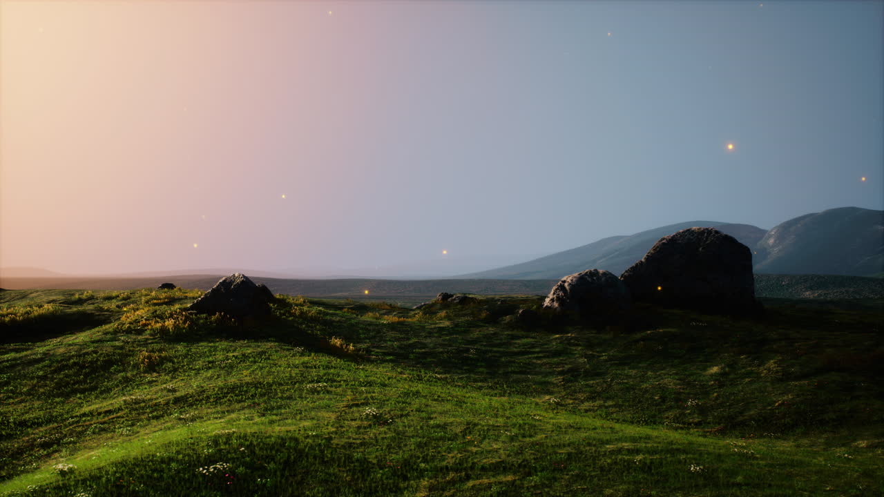 prado verde en el fondo de las montañas