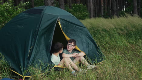 kids inside a camping tent