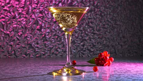 elegant sparkling cocktail with red berries