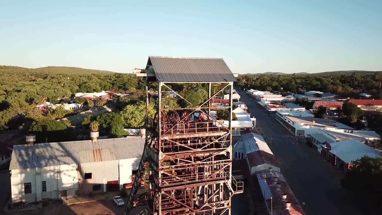 Beautiful rusted old copper mine shaft still standing in the middle of little mining town in Namibia called Tsumeb.