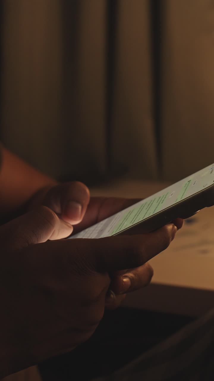 Man hands chatting and typing on smartphone macro closeup. Unrecognizable human typing text message tapping touchscreen keyboard using whatsapp application in social media. User holding mobile phone