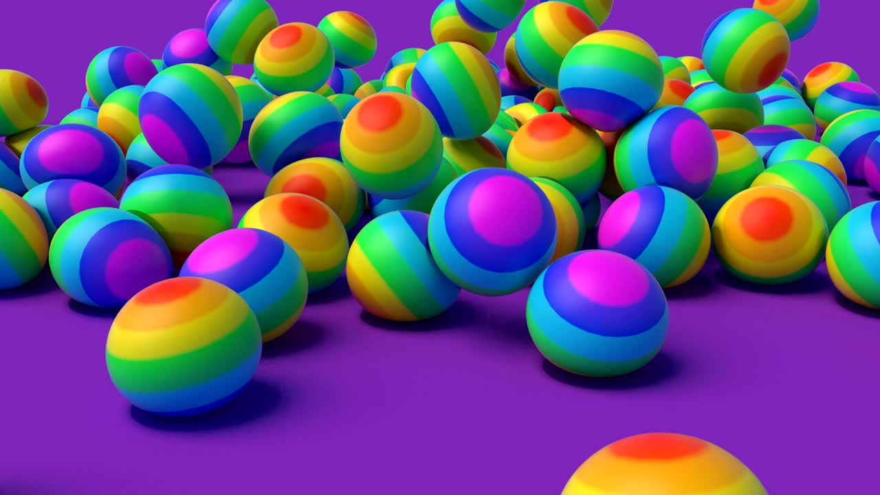 лгбт радужные резиновые шары падают на лилавую поверхность минималистские кадры на обложке 4k