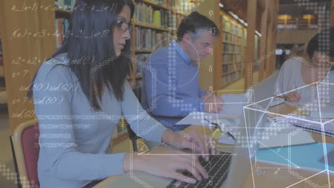 profesores que estudian en una biblioteca