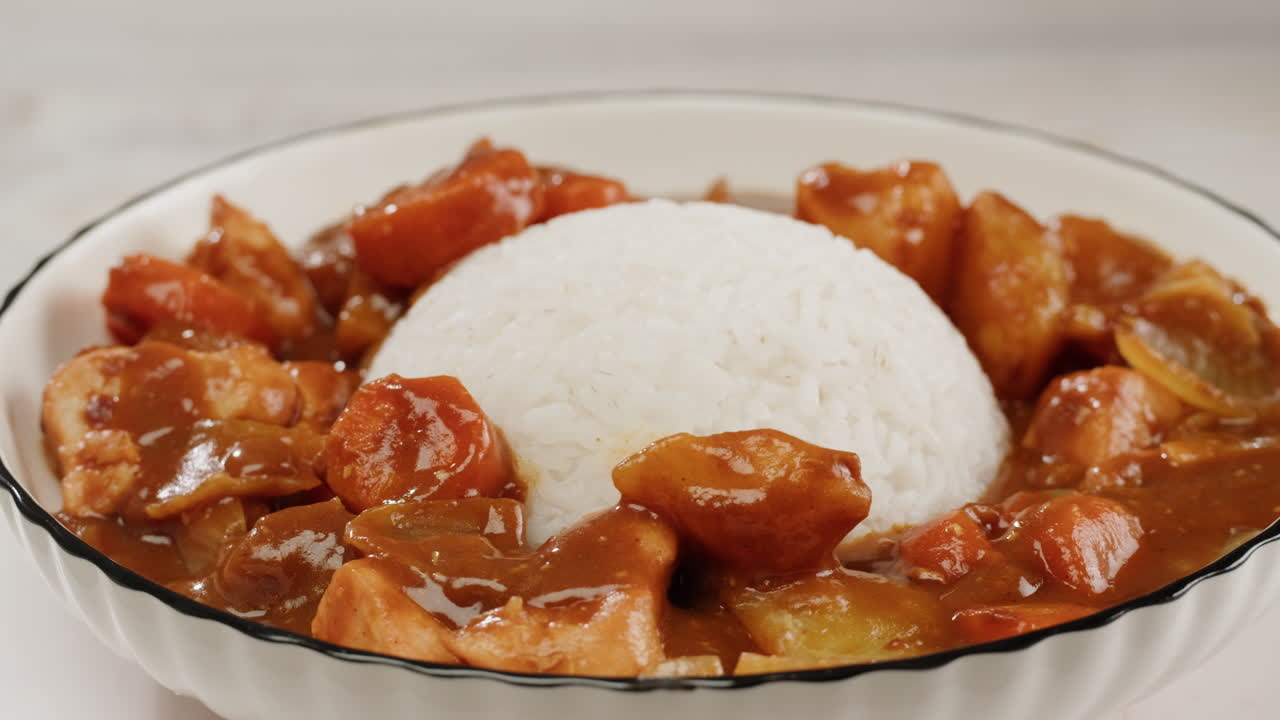 Japanese curry rice with fry pork Tonkatsu, Katsu Kare, Japanese breaded cooking dinner in restaurant, close up macro of asian food